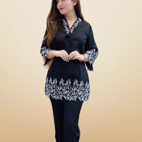 Women's ethnic kurti pant set with embroidery and sequin work – perfect for festive wear.