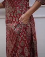 Kurti styled with accessories and jewelry for a complete outfit.