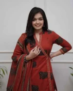 Red cotton A-line kurta set, elephant print, malmal dupatta, smiling model, ethnic wear for women