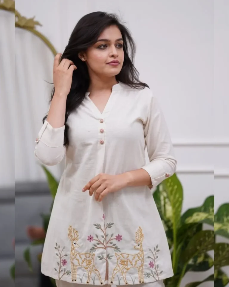 White embroidered kurta set, full view, smiling model, cotton flex ethnic wear, Indian fashion