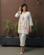 White brush print cotton flex coord set, smiling model, full front view, hand painted floral print